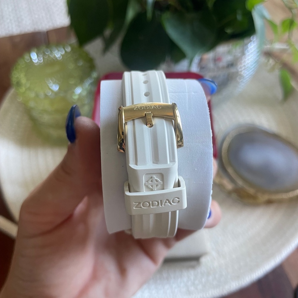 Zodiac Women's White and Gold Crystal Accent Watch - Picture 2 of 10